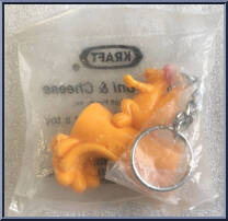 Cheesasaurus Rex from Cheesasaurus Rex - Keychains manufactured by Kraft [Back]