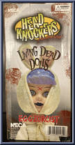 Eggzorcist from Living Dead Dolls - Head Knockers manufactured by Neca [Back]