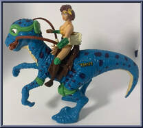 Cave Woman April (with Radical Raptor) from Teenage Mutant Ninja Turtles - Cave Turtles manufactured by Playmates [Loose]